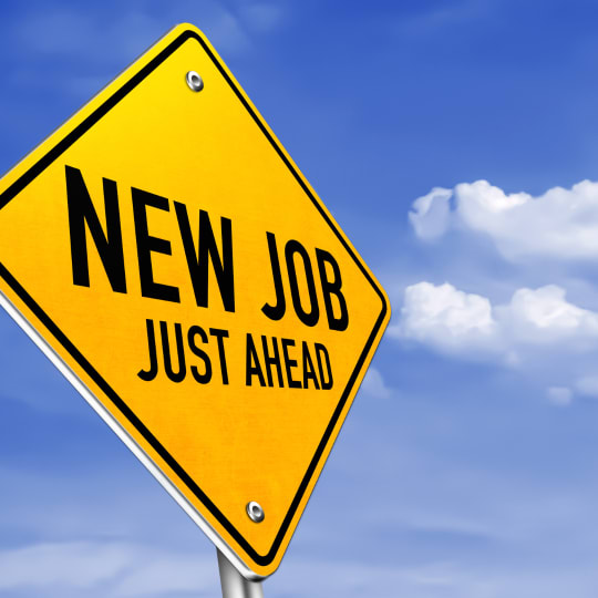 yellow road sign that reads new job just ahead