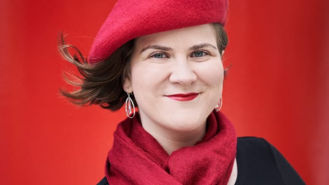 Ema Nikolovska messo soprano in red beret and scarf